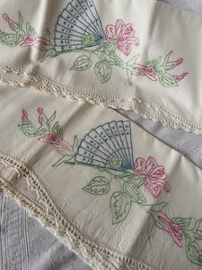 Vintage embroidered pillowcase with crochet lace edging